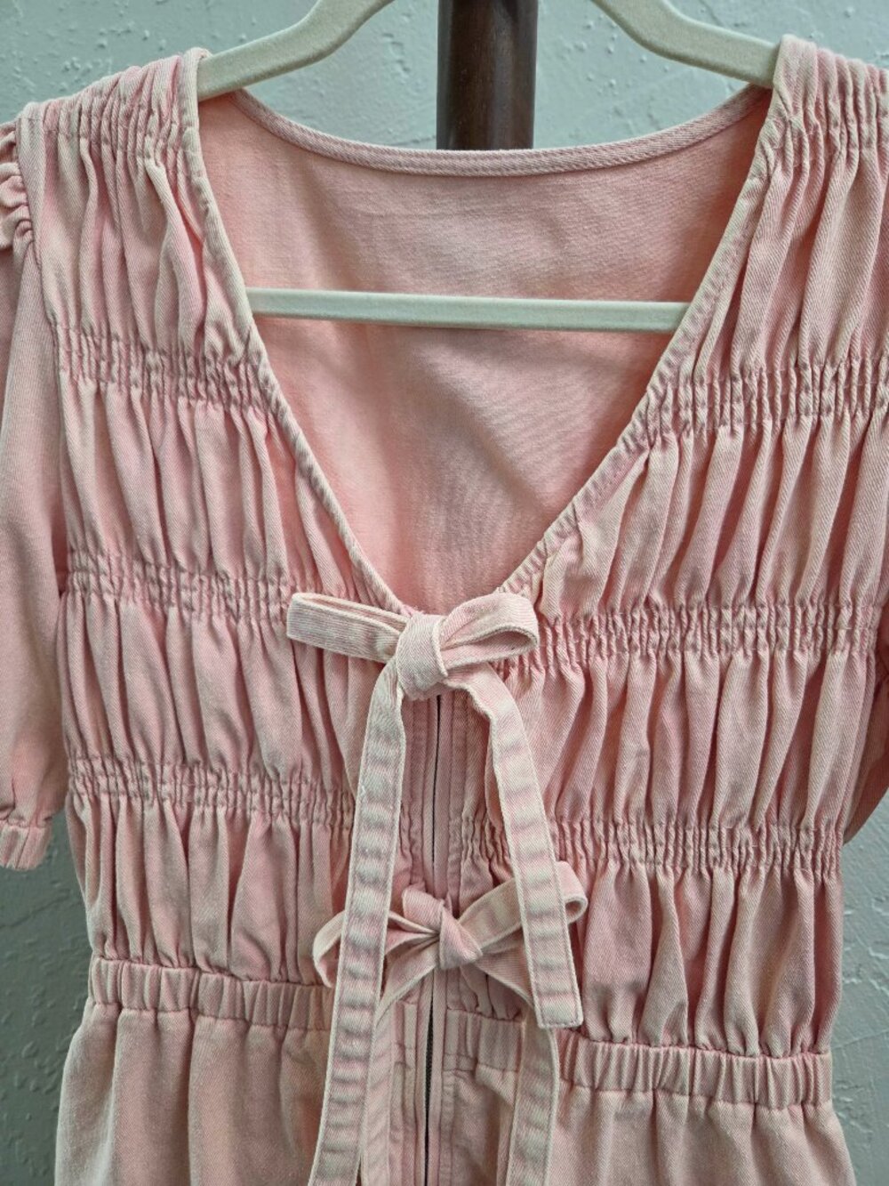 R78. Women's Smocked Denim Romper With Bow Ties - Picture 3 of 3